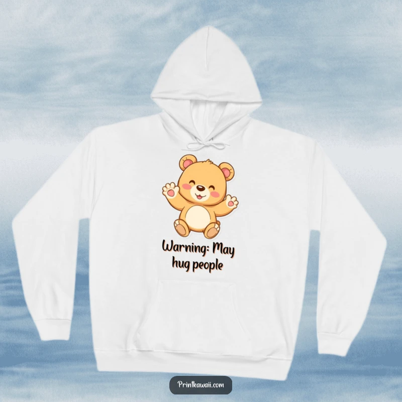 Funny, cozy hoodie featuring a joyful teddy bear character waving, providing warmth and a sense of cheerful companionship.